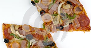 Rotating of Pepperoni tasty Italian pizza, Ham, Chicken sausage, Mushroom, Green capsicum, Onion, Black olive with tomato sauce