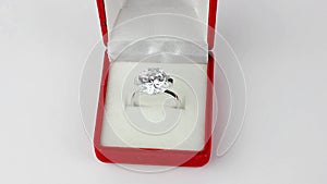 Rotating ring with big diamond in jewelry gift box
