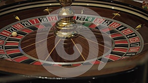 The rotating roulette wheel in the casino