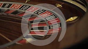 The rotating roulette wheel in the casino