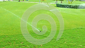 Rotating sprinkler over lawn irrigation device