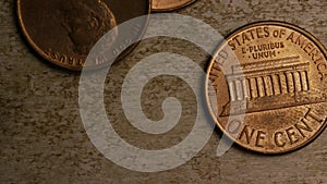Rotating stock footage shot of American pennies (coin - $0.01)