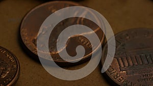 Rotating stock footage shot of American pennies (coin - $0.01)