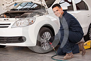 Rotating tires at an auto shop