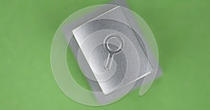 Rotation, button with MAGNIFYING GLASS symbol. Magnifying glass icon. Top view. Isolated