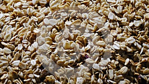 rotation food. granola. Oat flakes. Dry oat flakes, grains with berries and nuts. close-up. top view. Food background