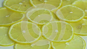 Rotation of a juicy yellow lemon. Top view, 360 degree rotation, close-up of a lemon in a cut.