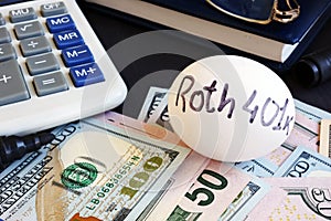 Roth 401k written on a side of egg and money.