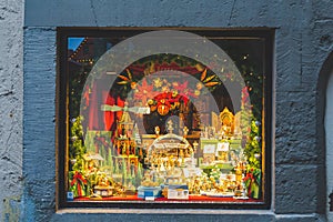 The Christmas museum window brightly decorated for Christmas holidays in Rothenburg ob der Tauber