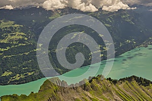 Rothorn Mountains with glacial turquoise water of Brienz lake / Brienzsee