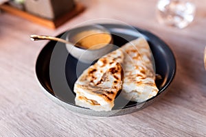 Roti bread with coconut sauce