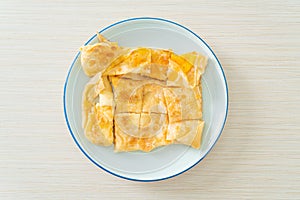 Roti with egg and sweetened condensed milk