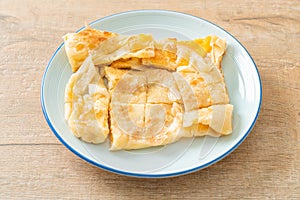 Roti with egg and sweetened condensed milk