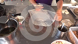 Roti Making, roti thresh flour by roti maker with oil and butter.