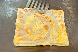 Roti or pancakes fring in some clarified butter photo