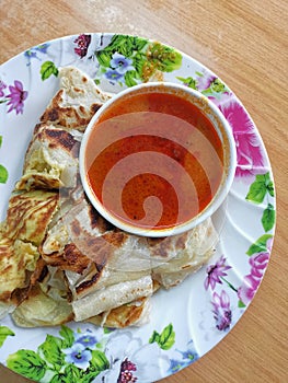 Roti Telur is A Variation of Roti Canai With Extra Egg, Chillies and Onion