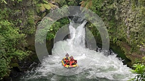 ROTORUA, NEW ZEALAND- DECEMBER, 2 2015: a group of thrill seekers whitewater rafting the kaituna river