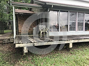Rotten porch deck needing repair photo