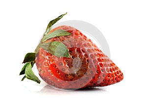 Rotten strawberries on white background