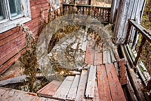 Rotten terrace old wooden house