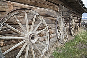 Rotten wood spoked wheels log cabin