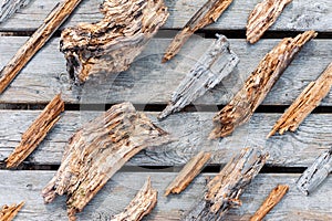Rotten worn wooden pieces and fragments