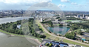 Rotterdam city skyline in the distance and the Feijenoord district. Nieuwe Maas river and sustainable solar panels on