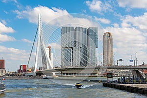 Rotterdam cityscape Erasmus bridge over the Meuse river and modern office buildings at Kop van Zuid, the Netherlands Holland