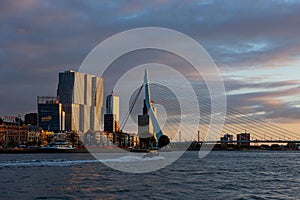 Rotterdam cityscape during twilight with dramatic sky