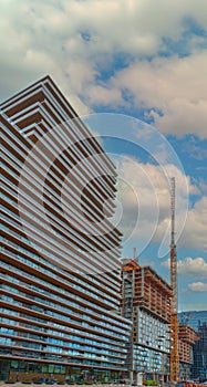 ROTTERDAM, NETHERLANDS - October 29, 2023 : Modern buildings against a blue sky