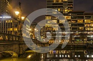 Rotterdam offices, bridge and apartments at night