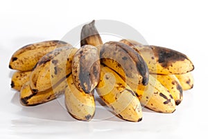 Rotting bananas isolated on white
