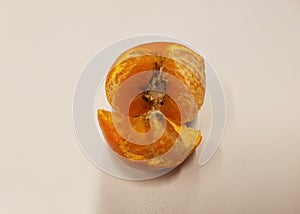 Rotting putrid inside of an orange citrus fruit