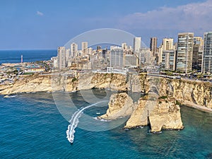 Rouche rocks in Beirut, Lebanon in the sea during daytime. Pigeon Rocks in Mediterranean sea.