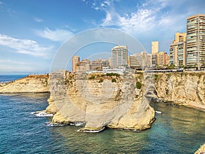 Rouche rocks in Beirut, Lebanon in the sea during daytime. Pigeon Rocks in Mediterranean sea.