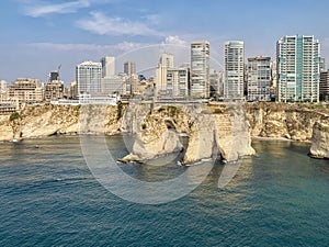 Rouche rocks in Beirut, Lebanon in the sea during daytime. Pigeon Rocks in Mediterranean sea.