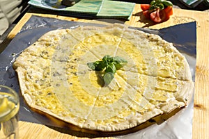 Roud cheese pizza on the table. Czech Republic