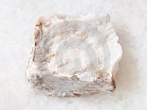 rough Anhydrite stone on white