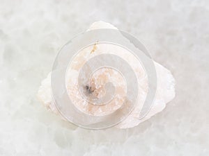 rough Barite stone on white marble