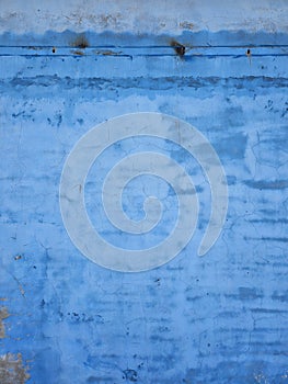 Rough blue concrete wall surface pattern texture as background
