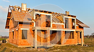 Rough brick building house under construction