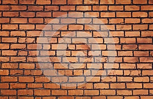 Rough brown brick wall background texture
