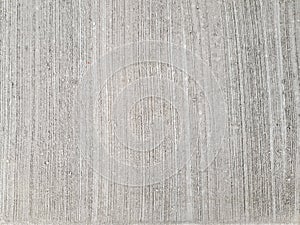 Rough brushed concrete texture, lines pattern on cement floor