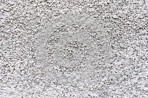 Rough bumpy texture of the concrete