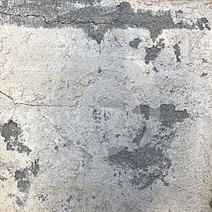 Rough cement wall texture in gray with cracks