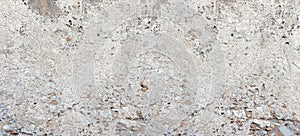 Rough concrete wall texture background creating abstract pattern