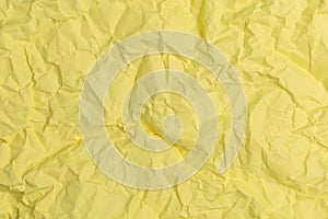 Rough crumpled texture surface of retro old vintage classic grunge paper. Background or backdrop. Soft yellow