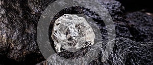 Rough diamond  precious stone in mines. Concept of mining and extraction of rare ores