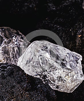 Rough diamond, precious stone in mines. Concept of mining and extraction of rare ores