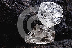 Rough diamond, precious stone in mines. Concept of mining and extraction of rare ores , macro photography